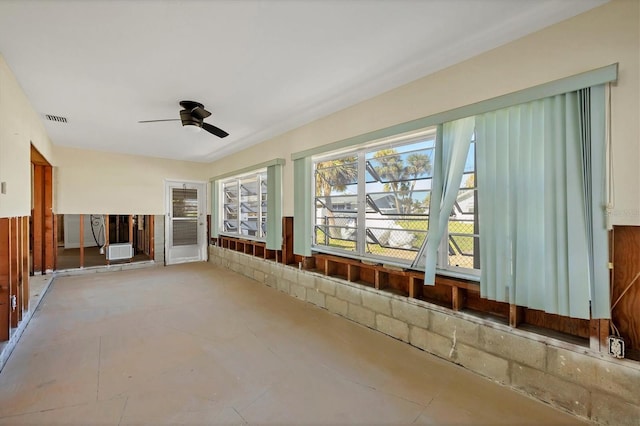 unfurnished room featuring ceiling fan