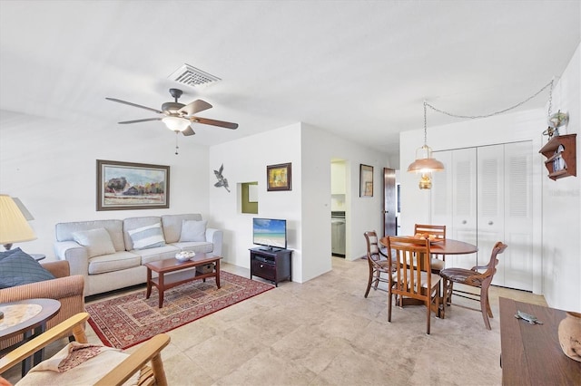 living room with ceiling fan