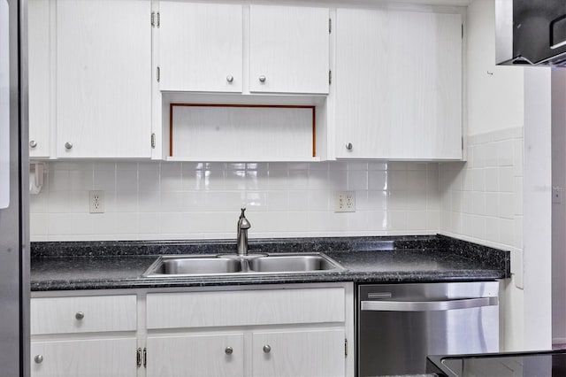 kitchen with stainless steel appliances, white cabinetry, and sink