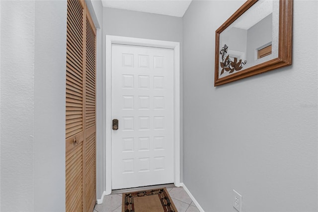 interior space featuring light tile patterned floors