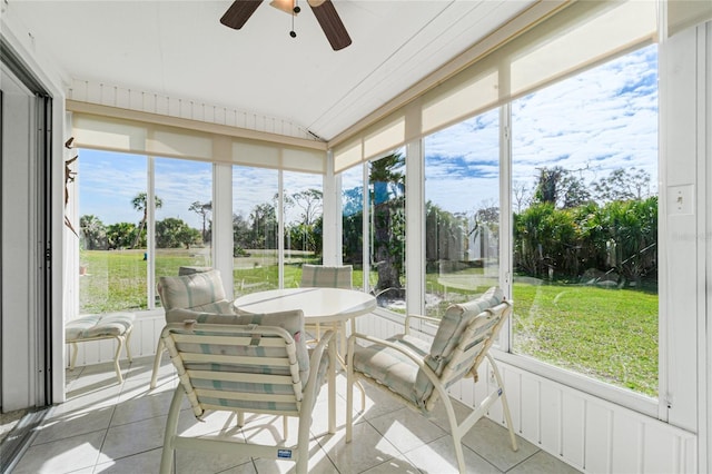 sunroom / solarium with ceiling fan and plenty of natural light