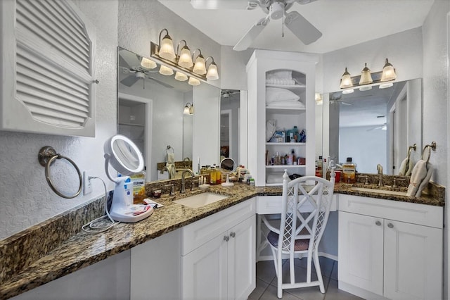 bathroom featuring tile patterned floors and vanity