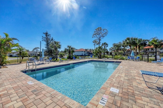 view of swimming pool featuring a patio