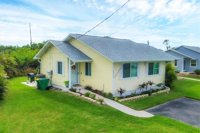 ranch-style house with a front yard