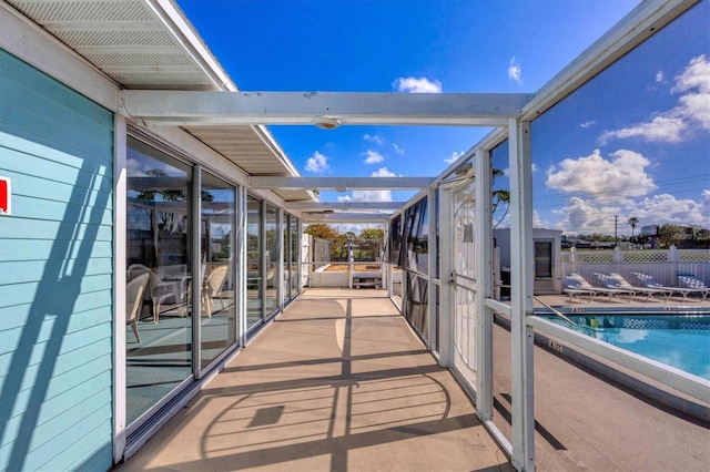 view of patio with a fenced in pool