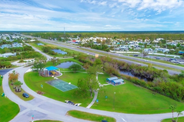 drone / aerial view with a water view