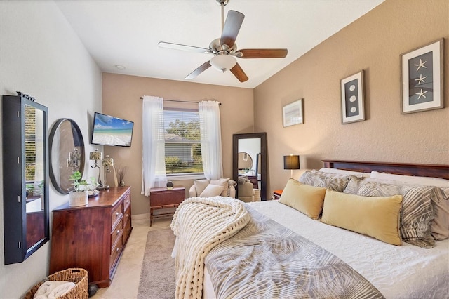 bedroom with access to exterior and ceiling fan