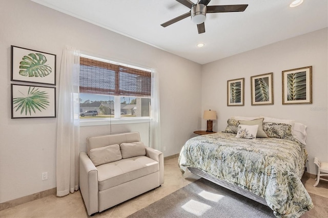 tiled bedroom with ceiling fan