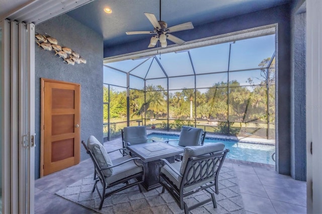 view of patio / terrace with a lanai and ceiling fan