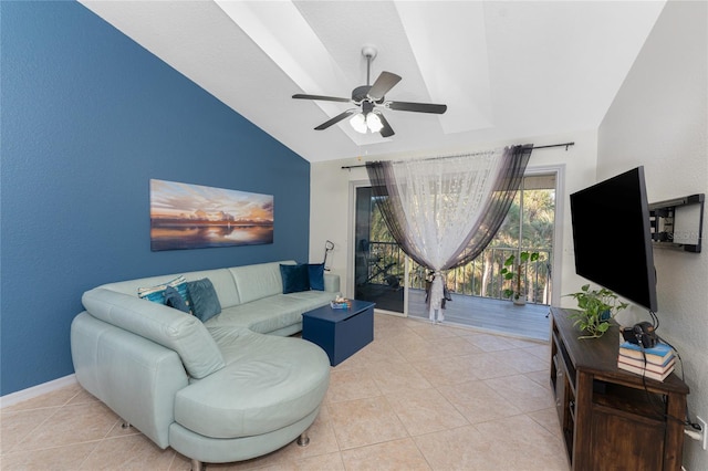 tiled living room with ceiling fan and lofted ceiling