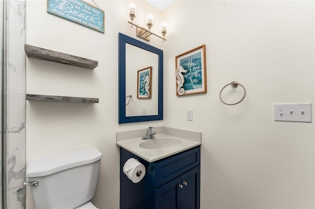 bathroom with vanity and toilet