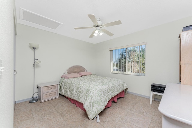 bedroom with ceiling fan and light tile patterned flooring