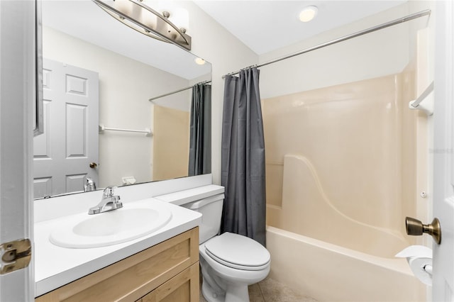 full bathroom with tile patterned floors, vanity, toilet, and shower / tub combo