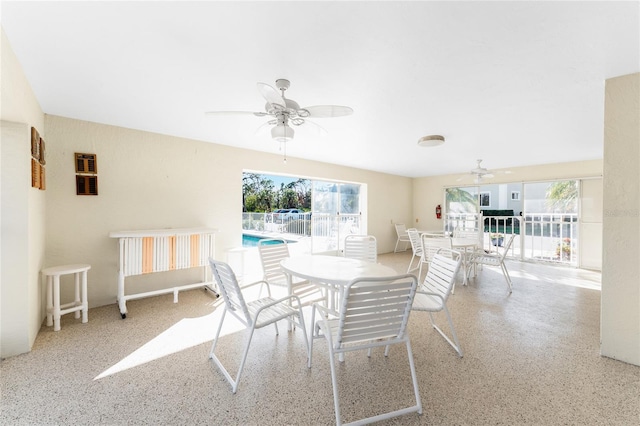 dining space featuring ceiling fan