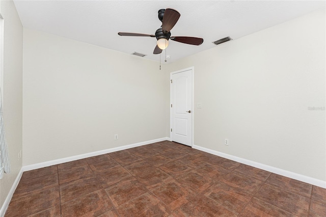 spare room featuring ceiling fan