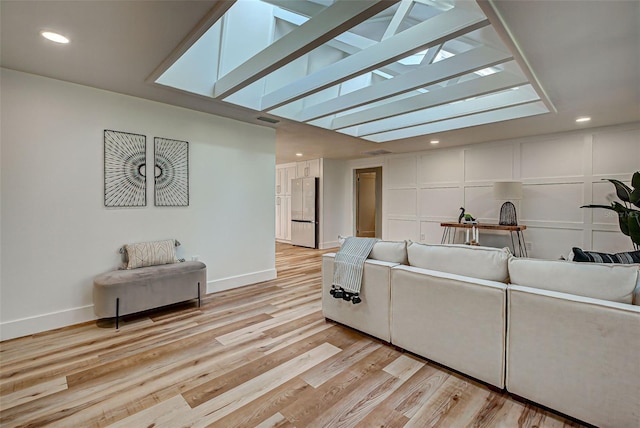 living room with light hardwood / wood-style floors