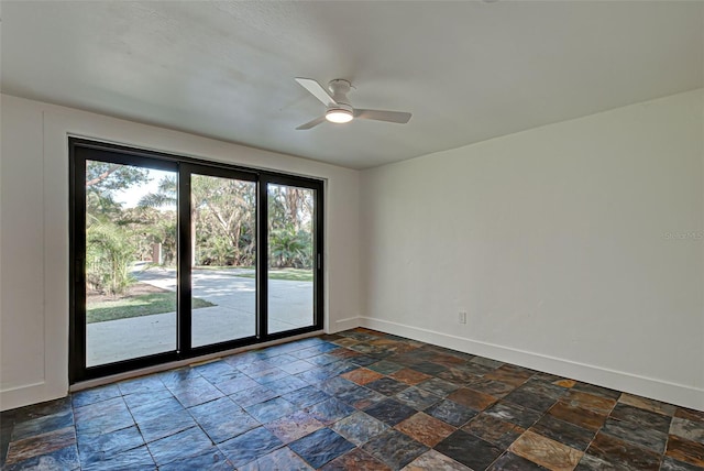 empty room featuring ceiling fan