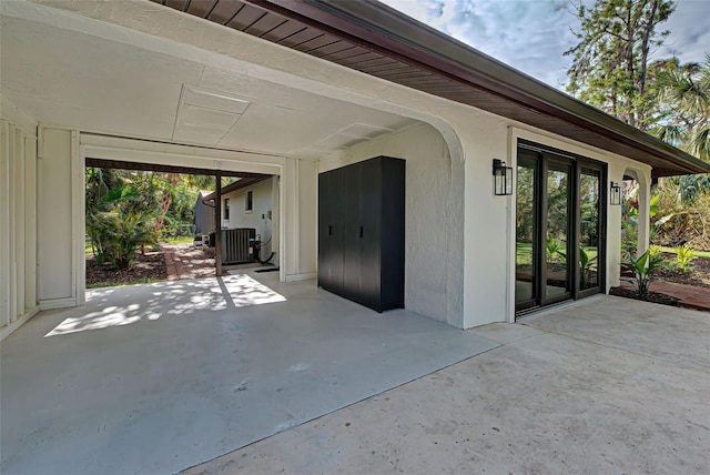 view of patio with central AC