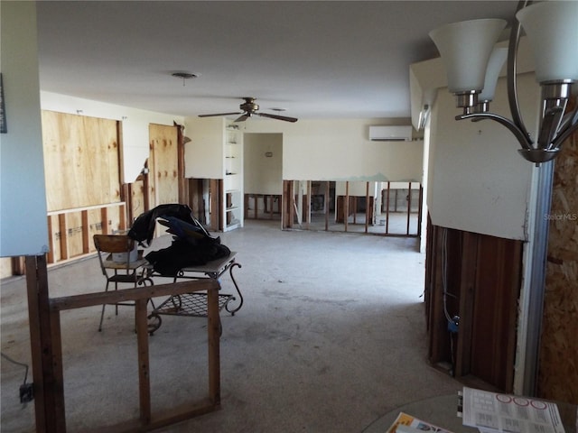 misc room with carpet, ceiling fan, and a wall mounted AC