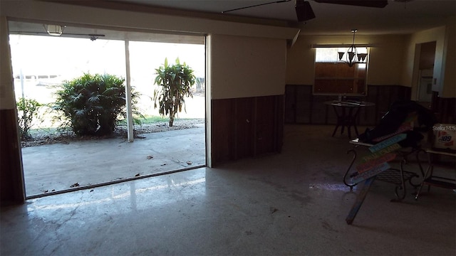 unfurnished dining area with concrete flooring