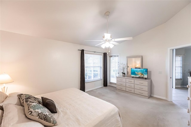 bedroom with ceiling fan and light colored carpet