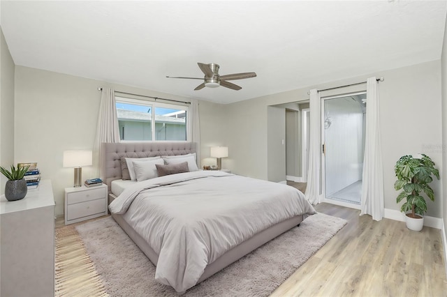 bedroom with ceiling fan and light hardwood / wood-style floors