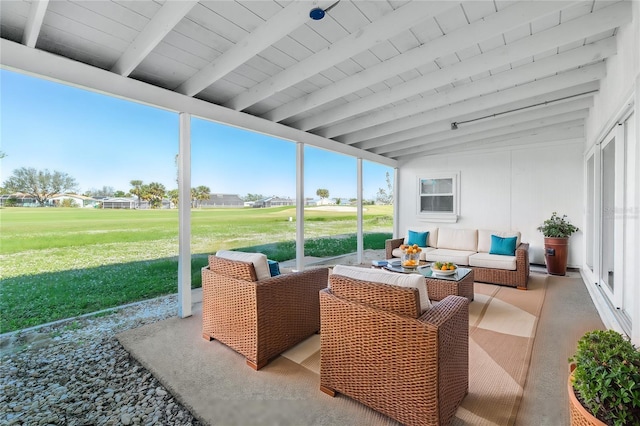 sunroom / solarium with lofted ceiling with beams and wood ceiling