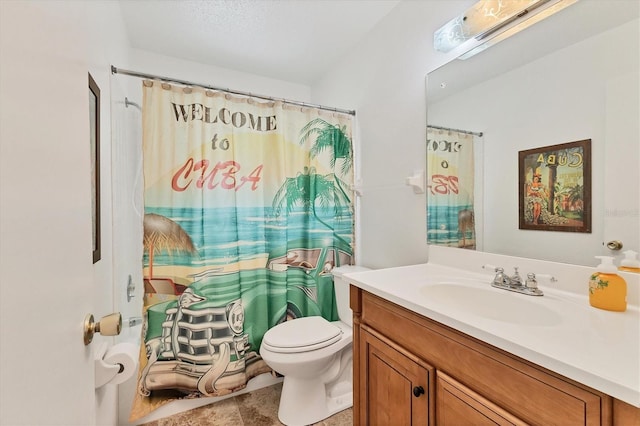 bathroom with tile patterned floors, a shower with curtain, vanity, and toilet