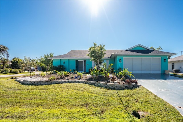 ranch-style home featuring a front lawn and a garage