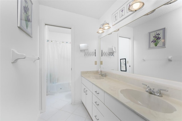 full bathroom with double vanity, a sink, and a shower with shower curtain