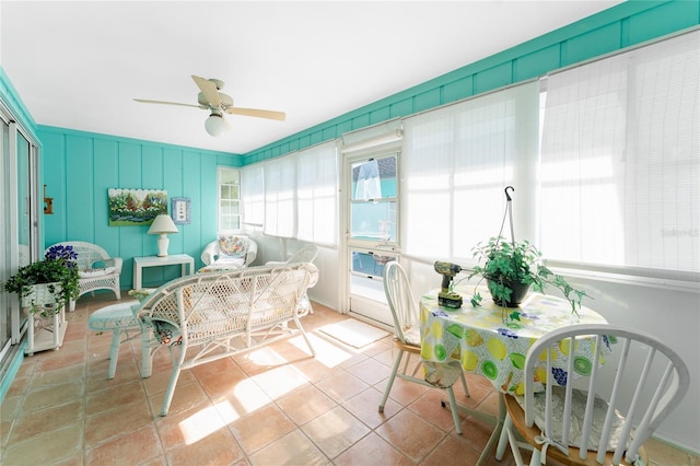 sunroom / solarium with ceiling fan