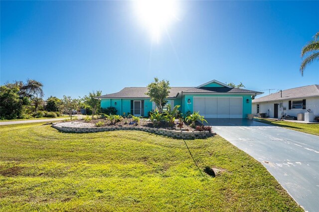 single story home with an attached garage, stucco siding, concrete driveway, and a front yard