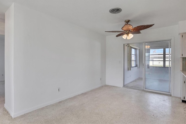 empty room featuring ceiling fan