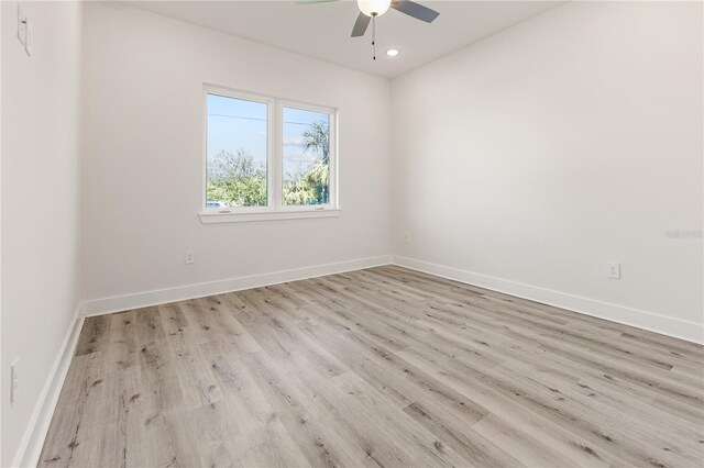 14681 Keystone Blvd, Port Charlotte, FL 33981 - empty room with ceiling fan, wood finished floors, baseboards, and recessed lighting