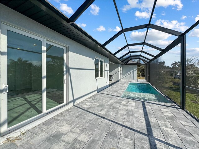 14681 Keystone Blvd, Port Charlotte, FL 33981 - outdoor pool with glass enclosure and a patio