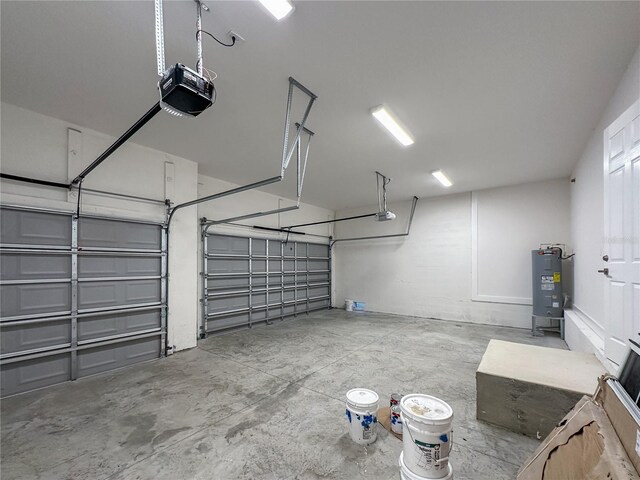 14681 Keystone Blvd, Port Charlotte, FL 33981 - garage with a garage door opener and electric water heater