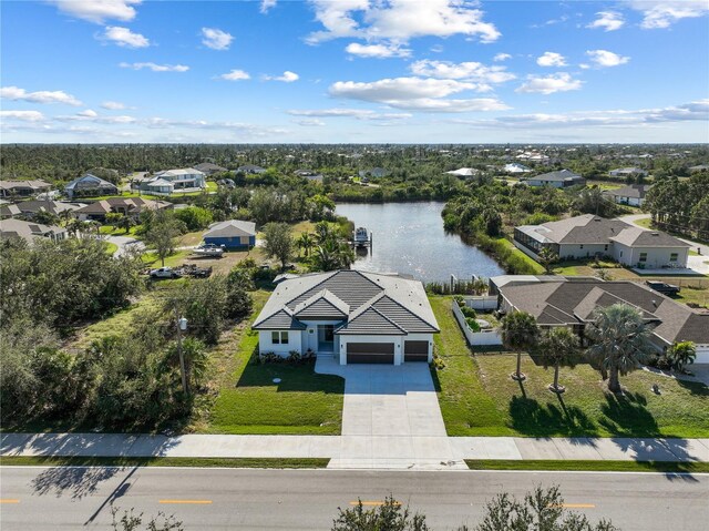 drone / aerial view featuring a water view