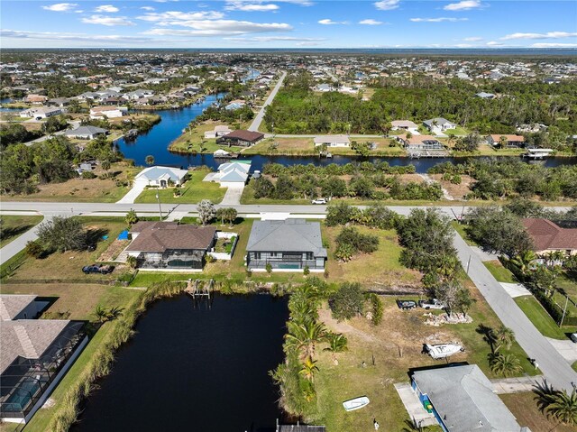 14681 Keystone Blvd, Port Charlotte, FL 33981 - aerial overview of property's location with a nearby body of water and nearby suburban area