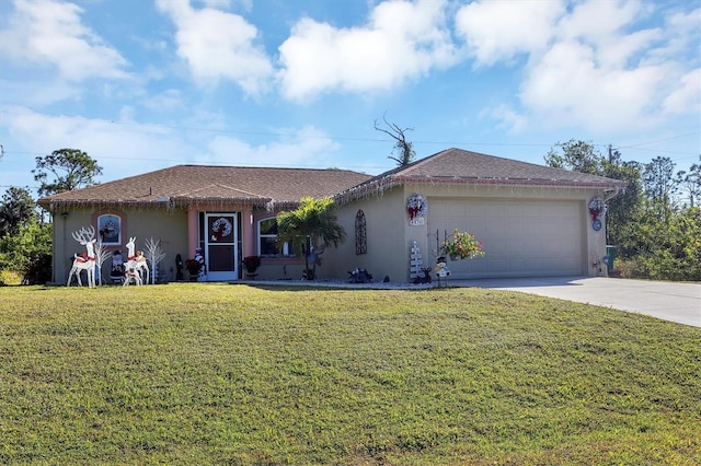 ranch-style house featuring a front yard and a garage