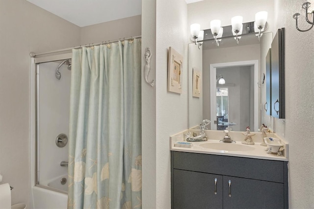 bathroom with vanity and shower / bath combo with shower curtain