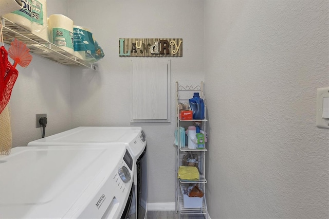 laundry area with separate washer and dryer