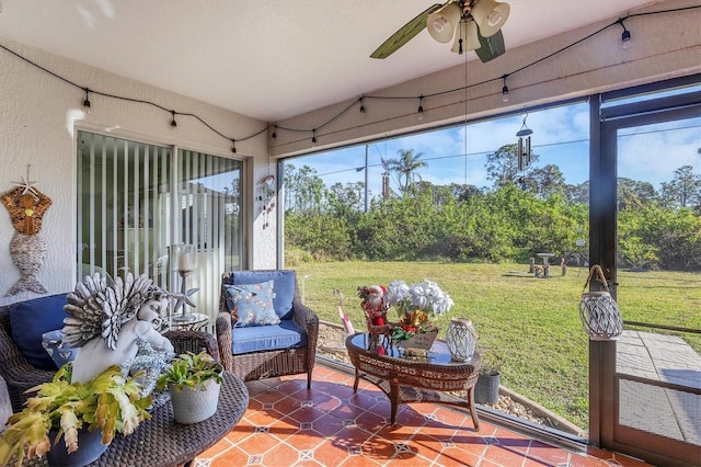 sunroom / solarium with ceiling fan