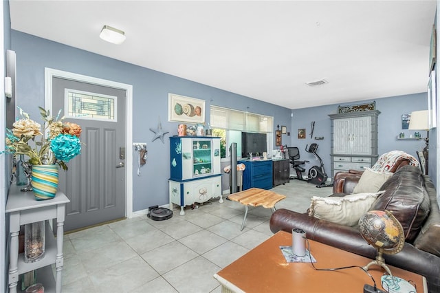 living room featuring light tile patterned flooring