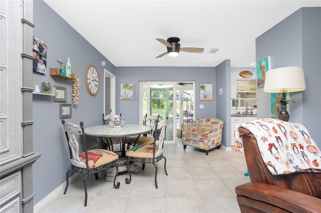 dining room with ceiling fan and light tile patterned floors