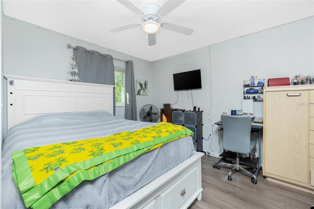 bedroom with ceiling fan and light hardwood / wood-style floors