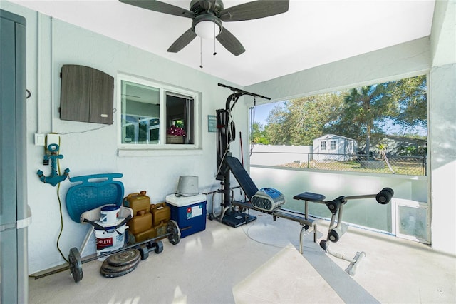 exercise room featuring ceiling fan