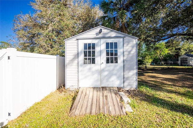 view of outdoor structure featuring a yard