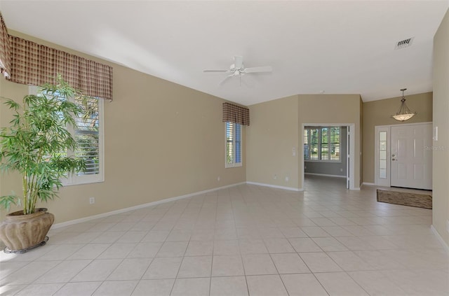 interior space with ceiling fan and light tile patterned flooring