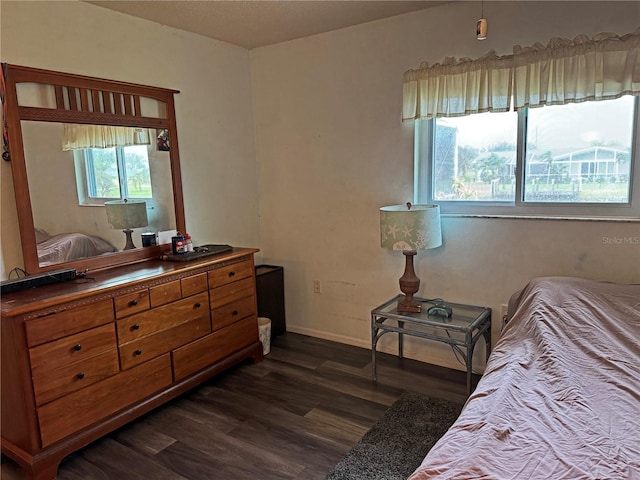 bedroom featuring dark hardwood / wood-style floors