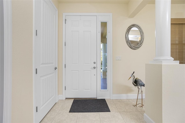 tiled entryway with ornate columns